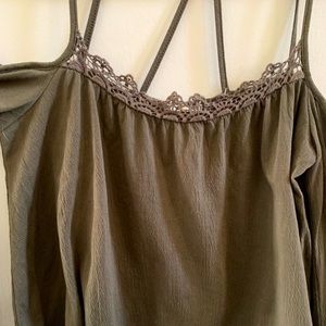 Cute top with unique collar/shoulder design.